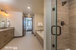 Master Bedroom En Suite- Walk-in shower, soaking tub, double vanity 